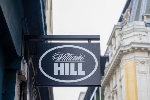 **Headline:** William Hill to Close Up to 200 Shops Following Increased Gambling Taxes, Owner States