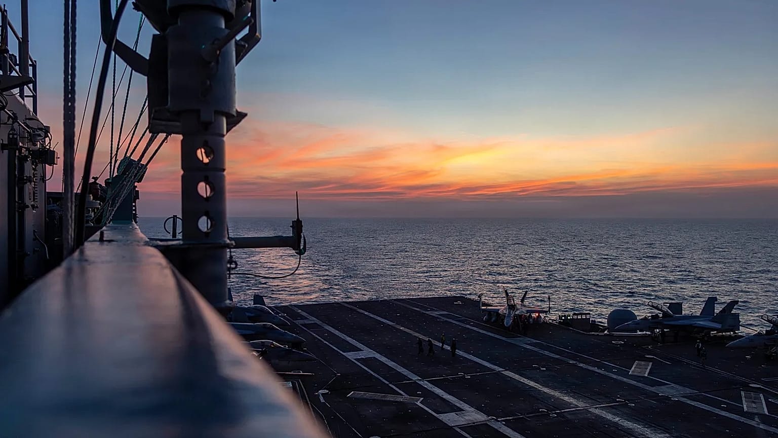 **Headline:** Trump announces deployment of large US naval force near Iran, urges Tehran to engage in talks