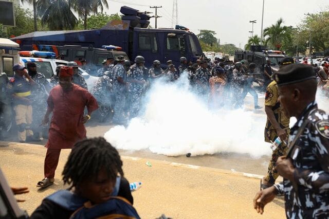 **Headline:** Nigerian Police Use Tear Gas to Disperse Protesters in Lagos Floating Slum Demolition