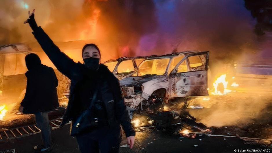 **Headline:** Death Toll in Iran Protests Surpasses 6,100 Amid US Military Presence in Region