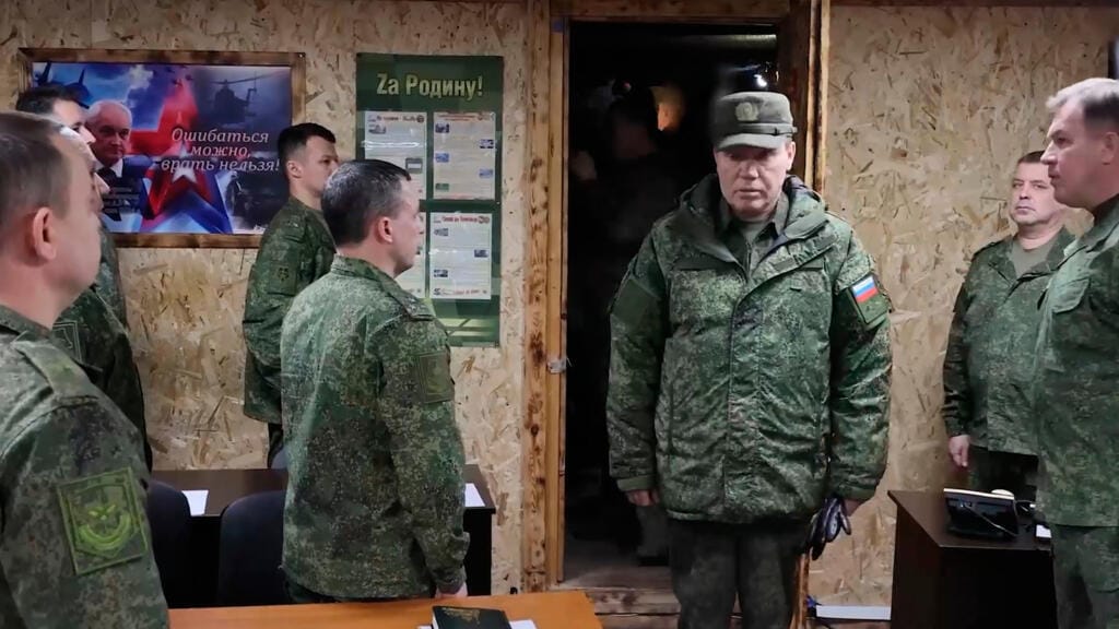 **Headline:** Russian Military Chief Visits Troops in Eastern Ukraine Amid Upcoming Peace Talks