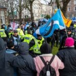 **Headline:** Police Investigate Perth Hotel Incident Amid Anti-Immigration Protests