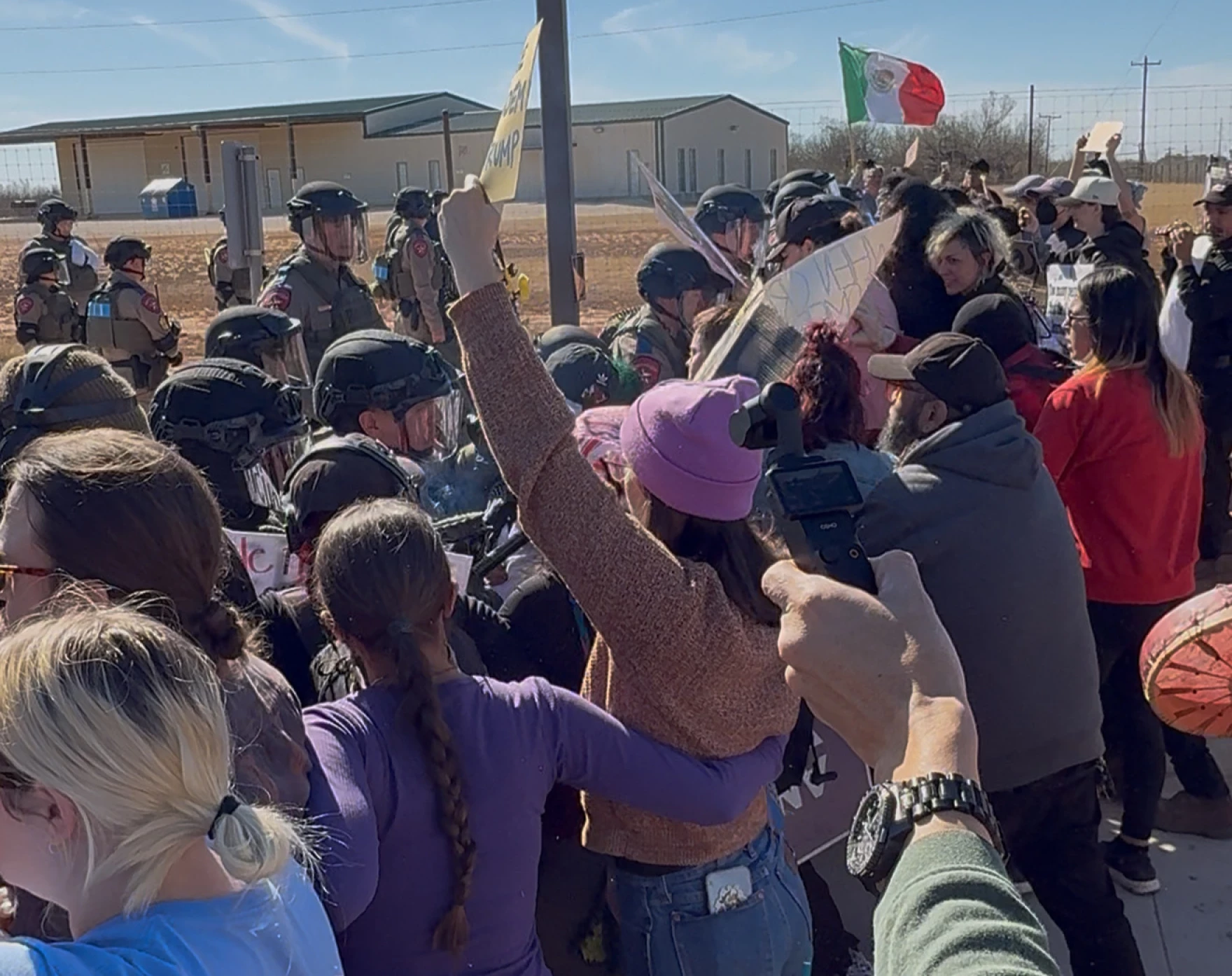 **Headline:** Protesters and Texas DPS Troopers Confronted Outside Dilley ICE Detention Center