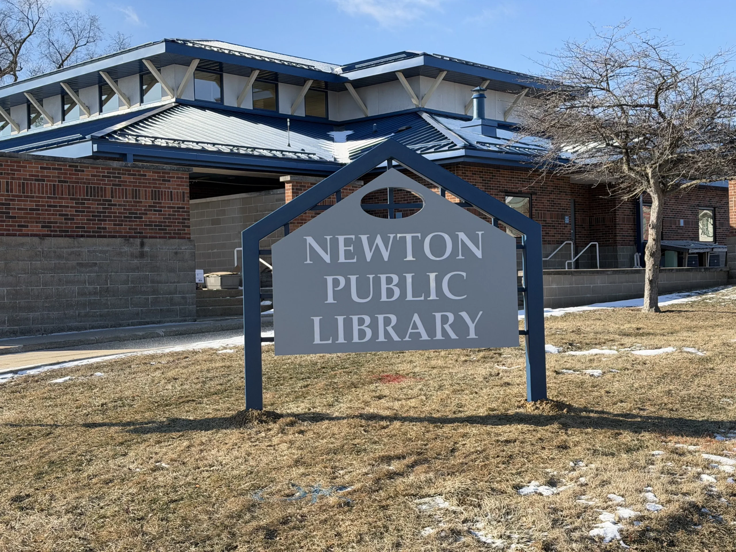 **Headline:** Newton Public Library Installs First Illuminated Sign