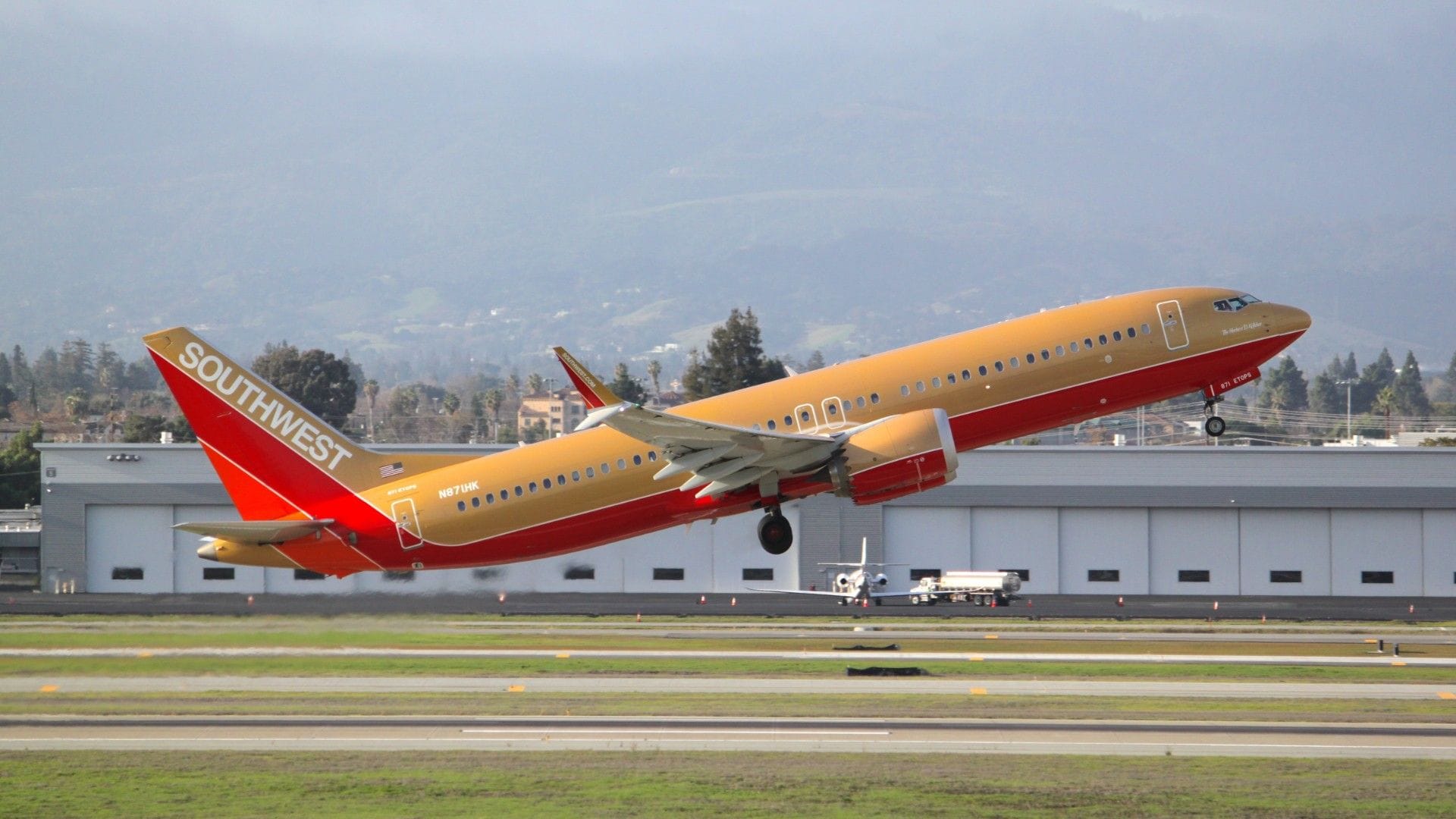 **Headline:** Southwest Airlines Uses Retro Boeing 737 MAX 8 for Last Flight with Open Seating