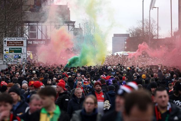 **Headline:** Thousands Gather to Protest Manchester United Ownership Ahead of Fulham Match