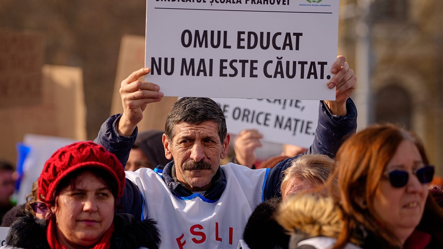 **Headline:** Thousands of Romanian Teachers Protest Proposed Government Austerity Measures