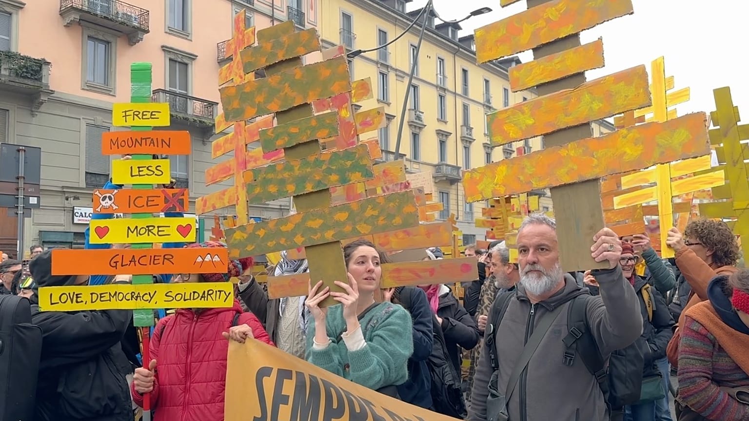 **Headline:** Protesters in Milan Voice Concerns Over Environmental and Economic Impact of 2026 Winter Olympics