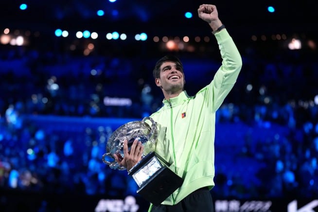 **Headline:** Carlos Alcaraz Wins 2026 Australian Open, Becomes Youngest Man to Complete Career Grand Slam