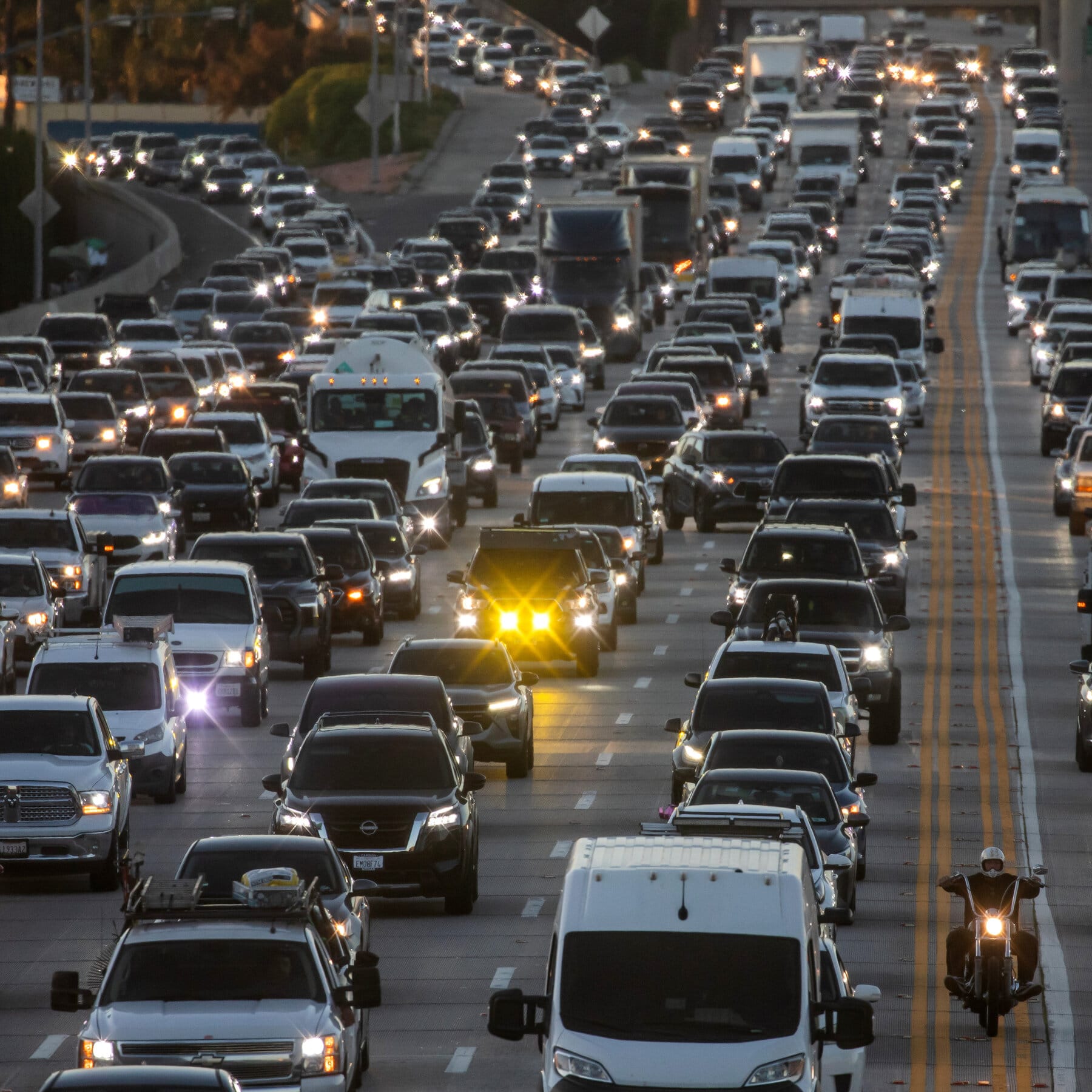 Environmental Protection Agency building with protest signs against climate regulation rollback