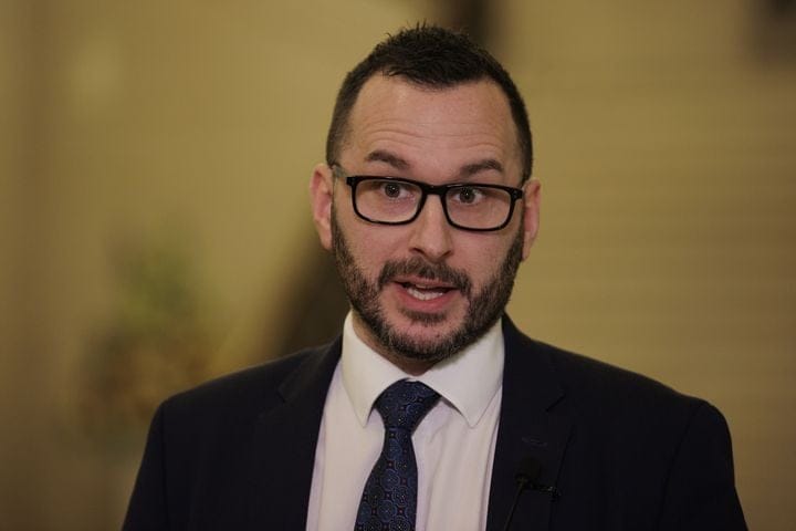 **Headline:** TUV MLA Timothy Gaston Suspended from Assembly for Two Days Following Code of Conduct Violation