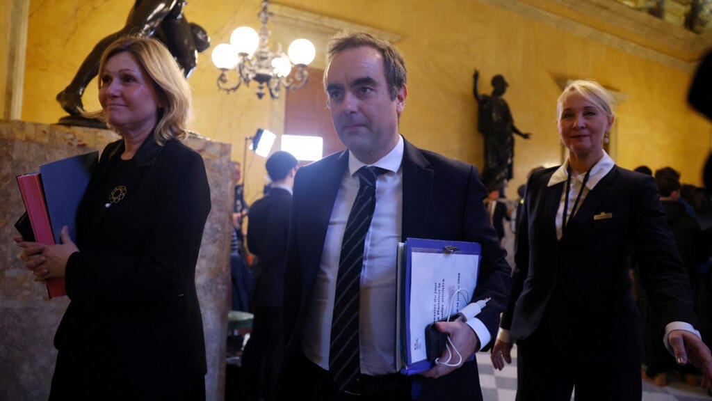 **Headline:** French Prime Minister Sebastien Lecornu Confronts Two No-Confidence Motions Following Budget Approval