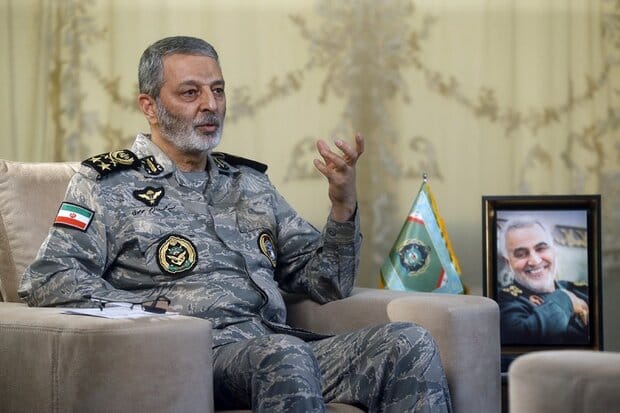 **Headline:** Iran’s Armed Forces Chief Warns of Severe Consequences for Any Attack