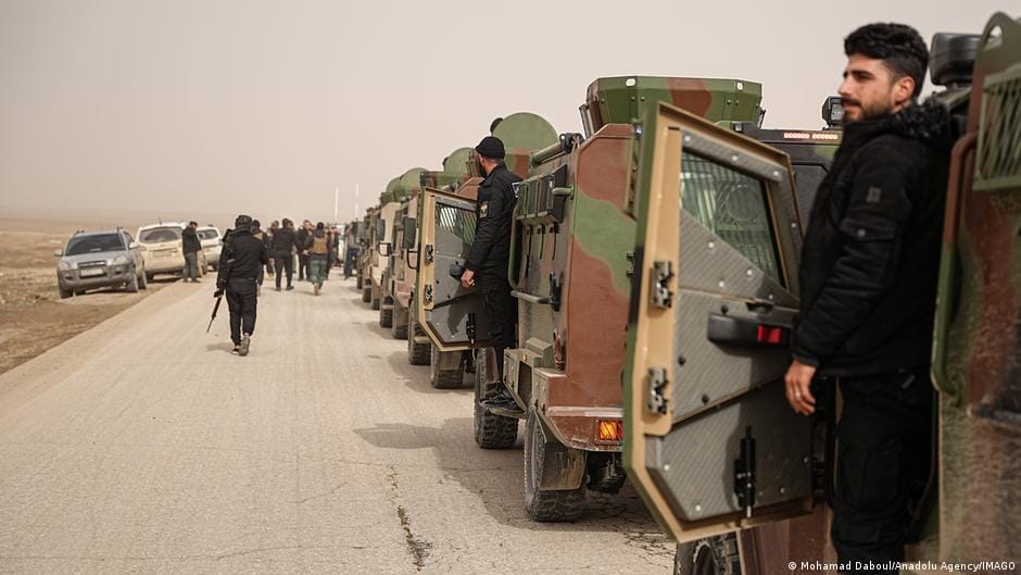 **Headline:** Syrian Government Forces Move into Kurdish-Controlled Al-Hassakeh Following Agreement