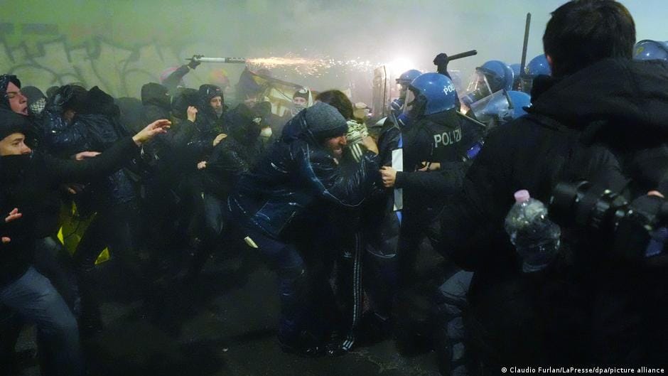 **Headline:** Clashes Erupt Near Milan Olympic Village During Environmental and Immigration Protest