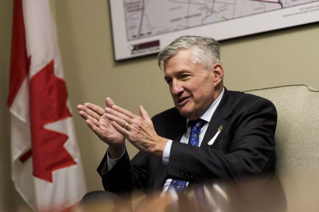 **Headline:** Liberal MP urges government to review federal return-to-office policy