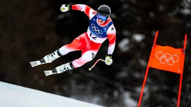 **Headline:** Swiss Skier Franjo von Allmen Wins Gold in Olympic Men’s Downhill