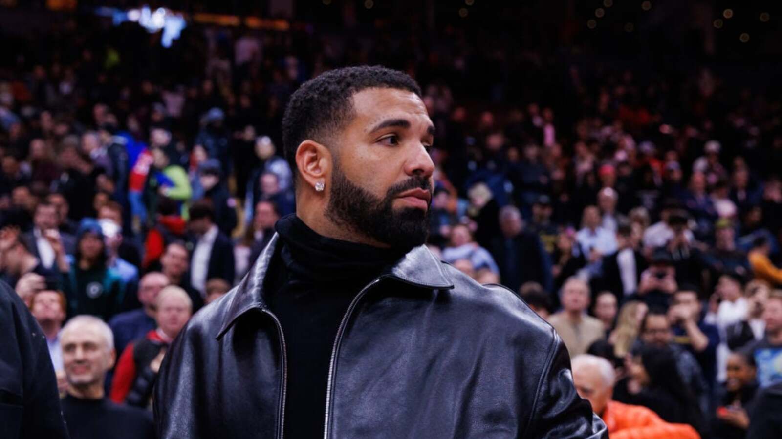 **Headline:** Drake’s $1 Million Bet on Patriots Fails as Team Loses Super Bowl LX