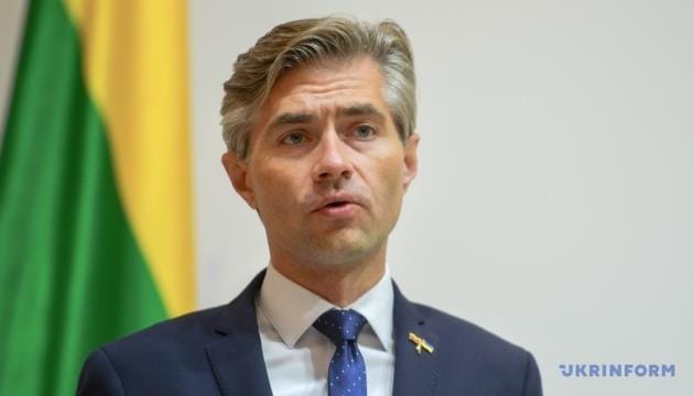 **Headline:** Lithuanian Foreign Minister Dismisses Putin’s Claims of Energy Ceasefire