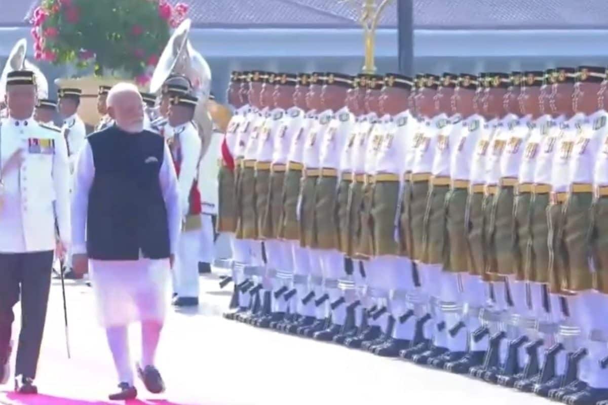 **Headline:** PM Modi Welcomed with Guard of Honour in Kuala Lumpur Ahead of Bilateral Talks