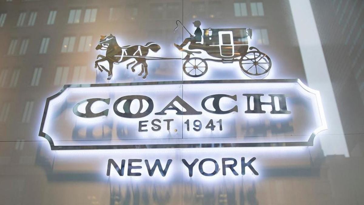 **Headline:** Coach Outlet Offers 2-in-1 Mini Chain Wallet Purse at Significant Discount